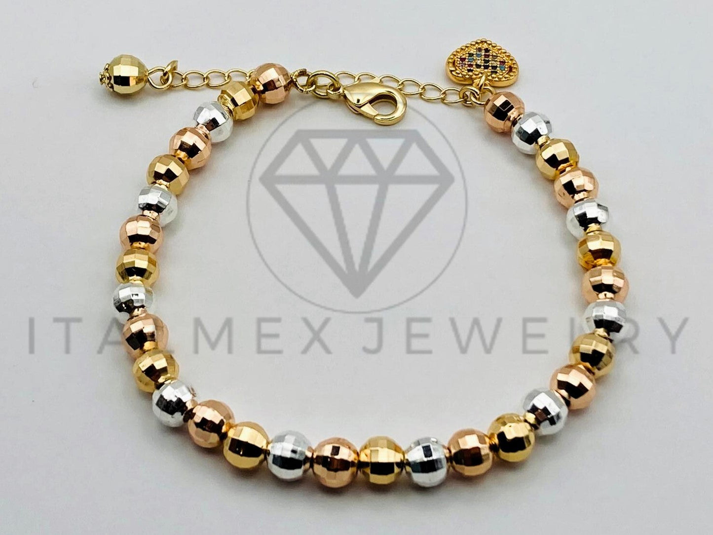 Pulsera de Lujo - 105546 - Bolitas Diamantadas con Corazón y Circonia Oro Laminado 18K