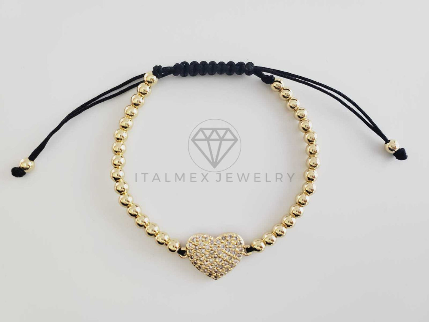 Pulsera de Lujo - 102681 - Diseño Bolitas con Corazón CZ Clara Oro Laminado 18K