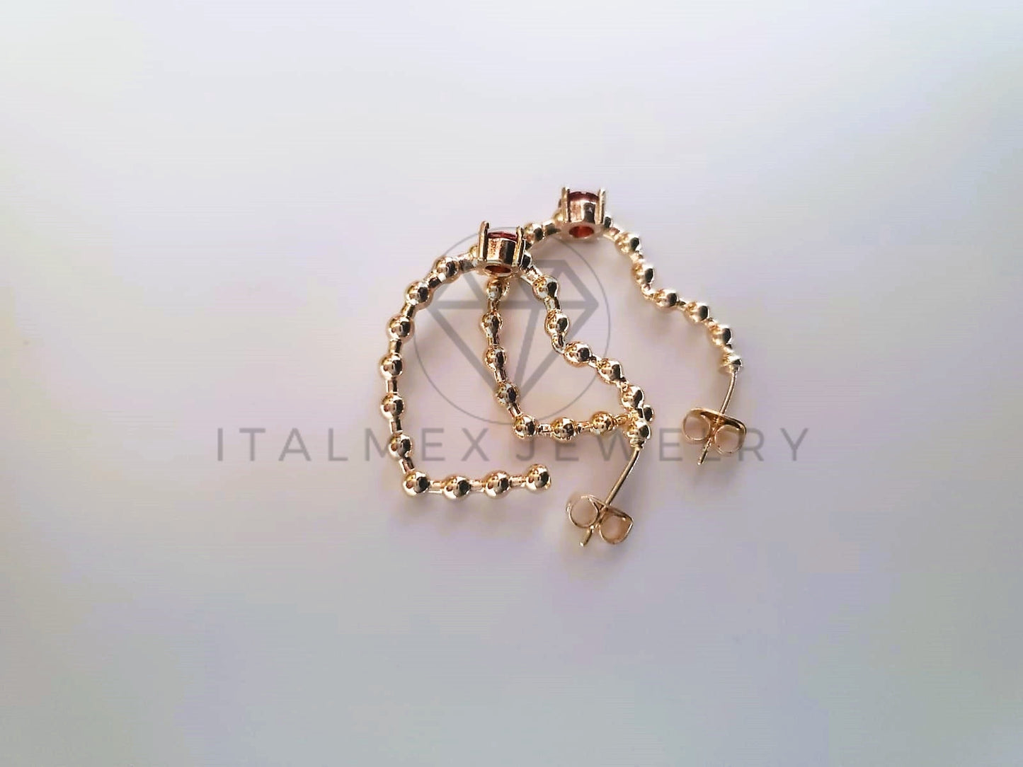 Arete de Lujo - 103774 - Broquel Largo Corazon y Bolitas CZ Roja Oro Laminado 18K