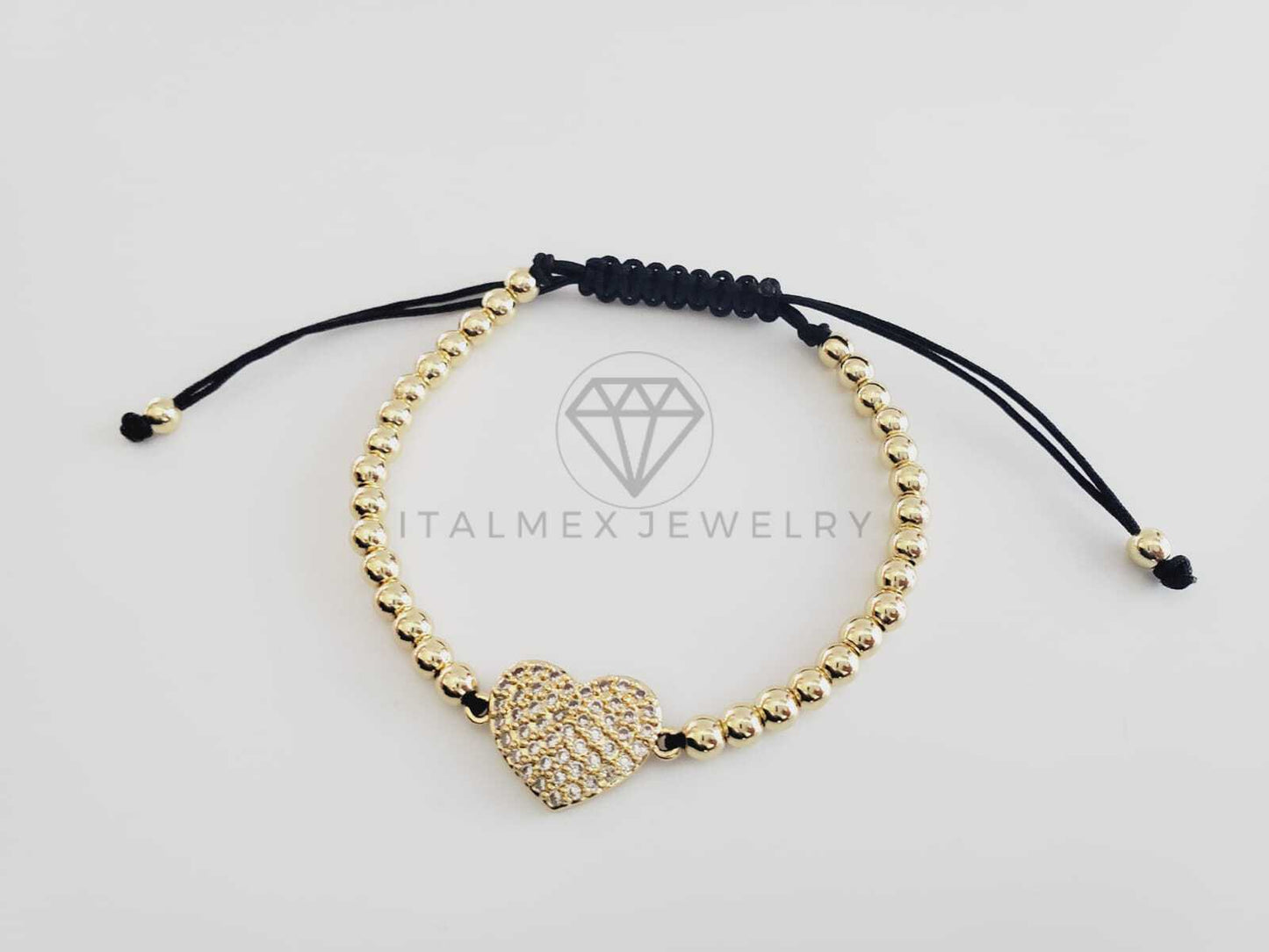 Pulsera de Lujo - 102681 - Diseño Bolitas con Corazón CZ Clara Oro Laminado 18K
