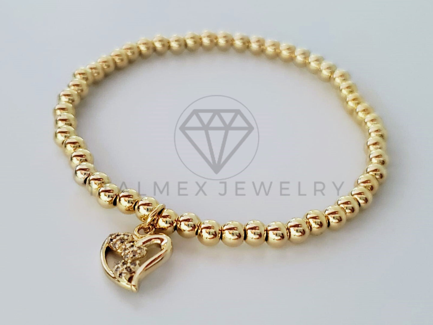 Pulsera de Lujo - 105011 - Diseño Bolitas con Corazón CZ Clara Oro Laminado 18K