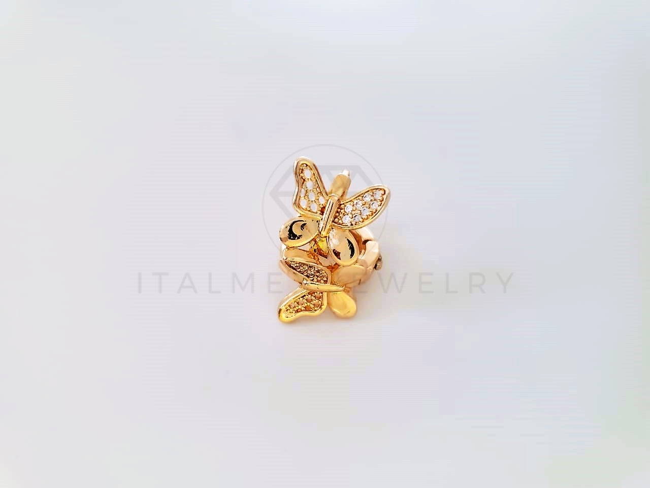 Huggie de Lujo - 104031 - Estilo Mariposa CZ Clara Oro Laminado 18K