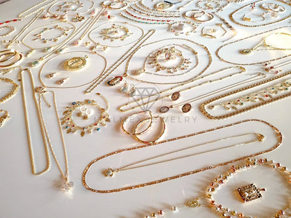 ¡Crece tu Negocio! - Paquete de 140+ Piezas Oro Laminado 18K - Mayoreo - Incluye Joyeria Religiosa